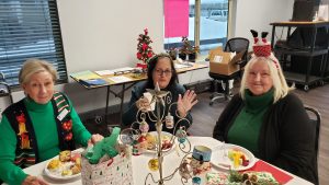 Holiday celebration including guests and the Mr. and Mrs. Wright game