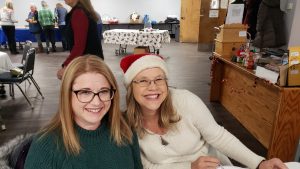 Holiday celebration including guests and the Mr. and Mrs. Wright game