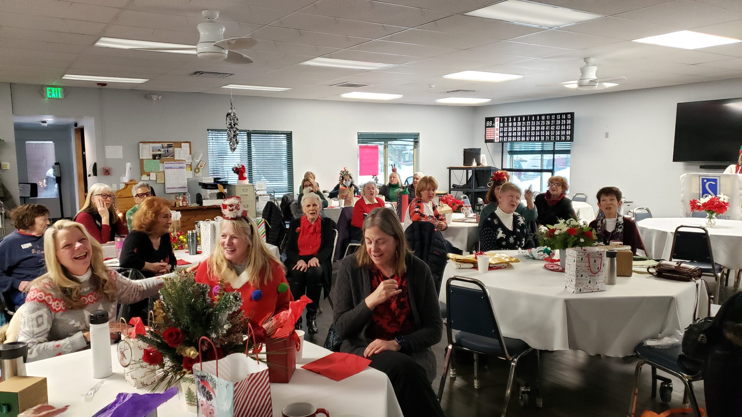 Holiday celebration including guests and the Mr. and Mrs. Wright game