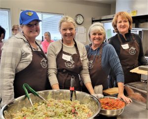 SITsters serving at Bread & Broth