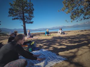 Yoga on the beach of Lake Tahoe with Susan Glasson