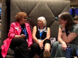 SITsters at the SNR Conference comparing notes