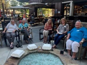 SITS gathered around the fire pit at Aleworx for a social for our members and an opportunity for interested women to join us.